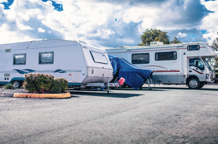 Caravans parked in an outdoor storage